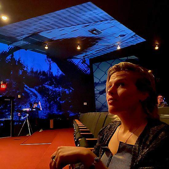 Chelsea Spengemann in a Stan VanDerBeek installation at Rice University Media Center, March 2020.