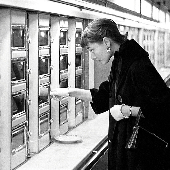 Audrey Hepburn Viewing the available food option in the Automat